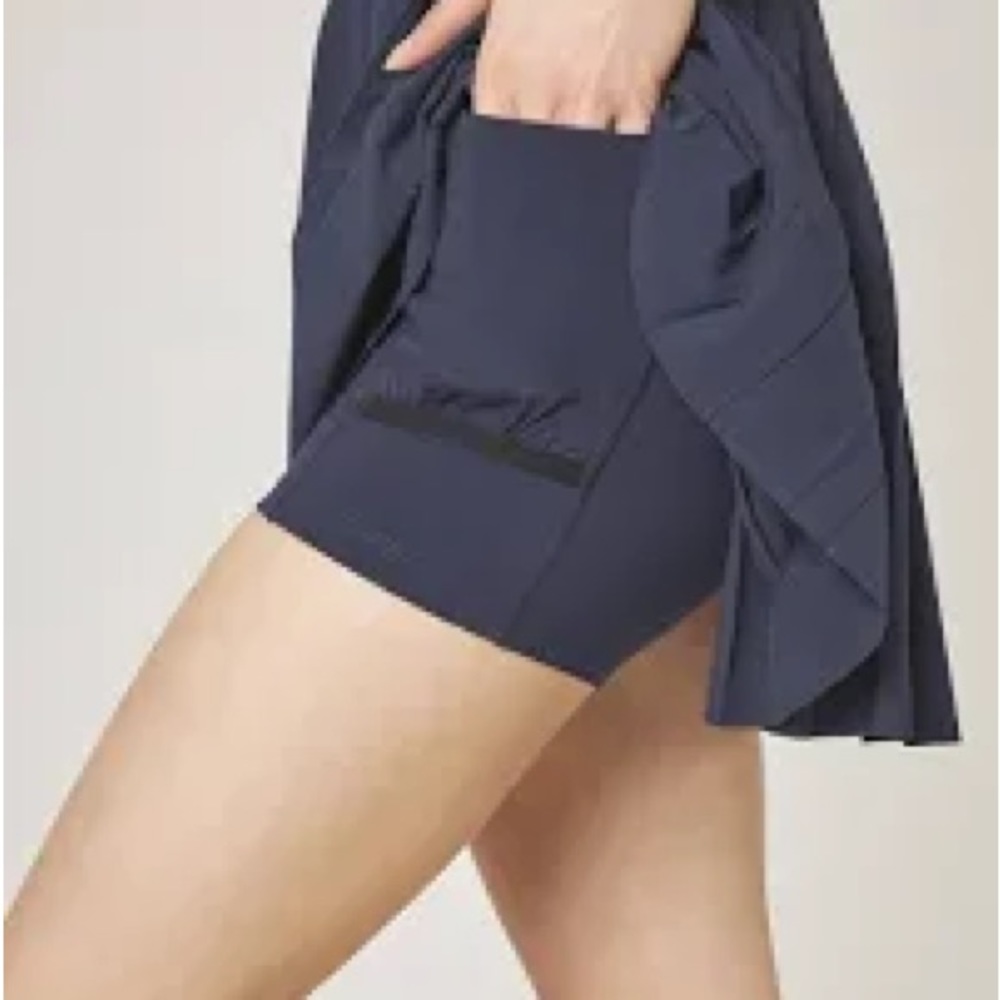 MPG Tennis Skort. Blue.  Has shorts built in. Medium